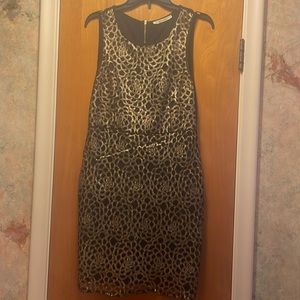 Black and gold mini dress